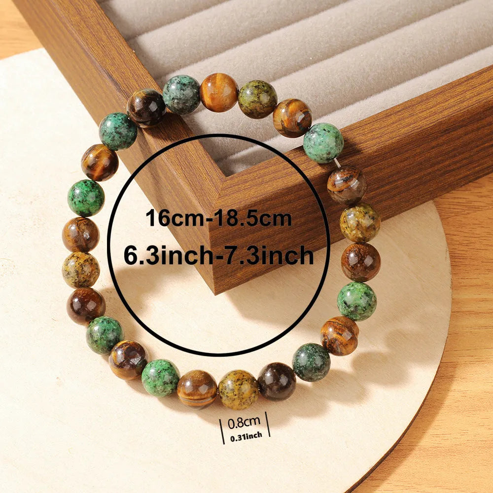 Handmade Tigereye fortune bracelet with natural stone and antique flower design in L1805 colour.