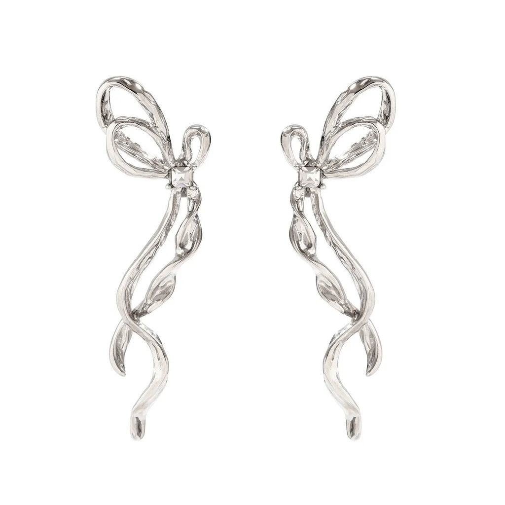White K bowknot earrings for women, alloy electroplated bow-shaped earrings, one pair