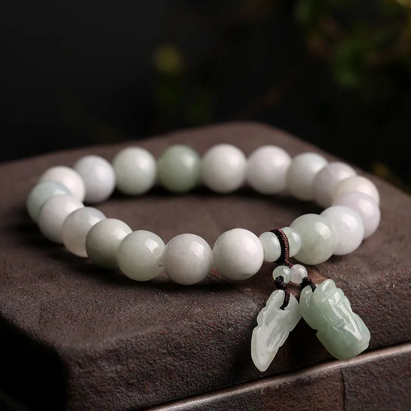 Natural jade bracelet with Maitreya Buddha and prosperity charm pendants