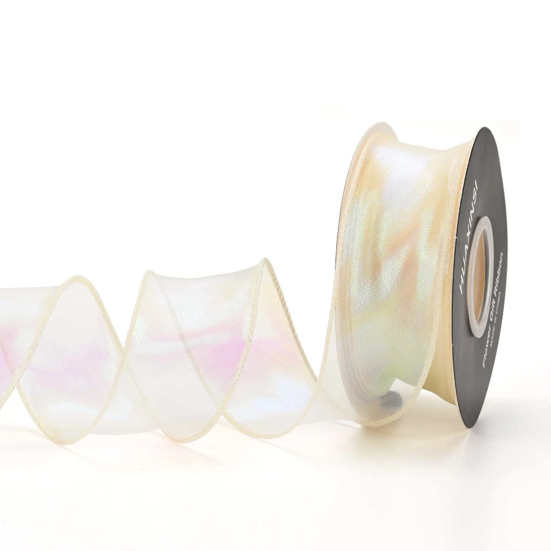 Roll of colourful fishtail yarn wave ribbon in mesh material, showing its textured, wave-like design.