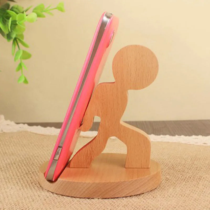 A decorative resin mobile phone stand holding a smartphone, shown in an animal design variant.