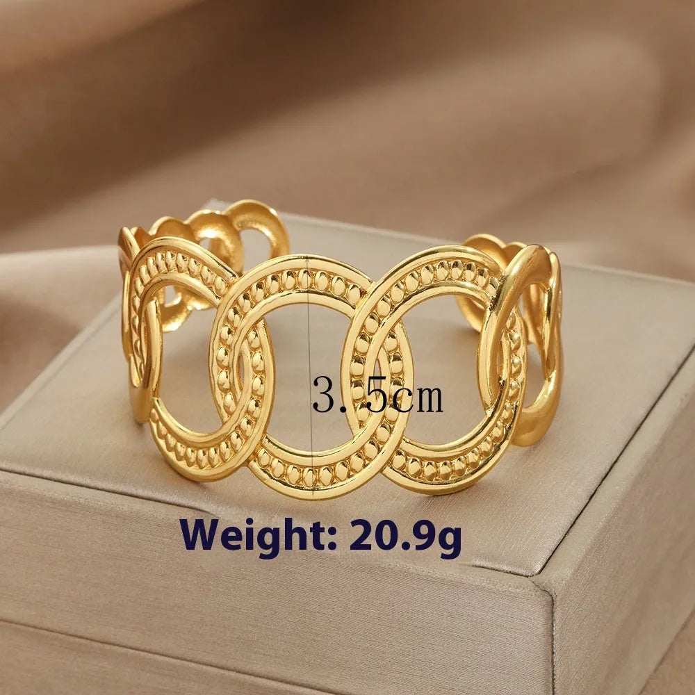 Stainless steel bracelet with lotus ring and glossy stripes, ellipse and line design, electroplated finish