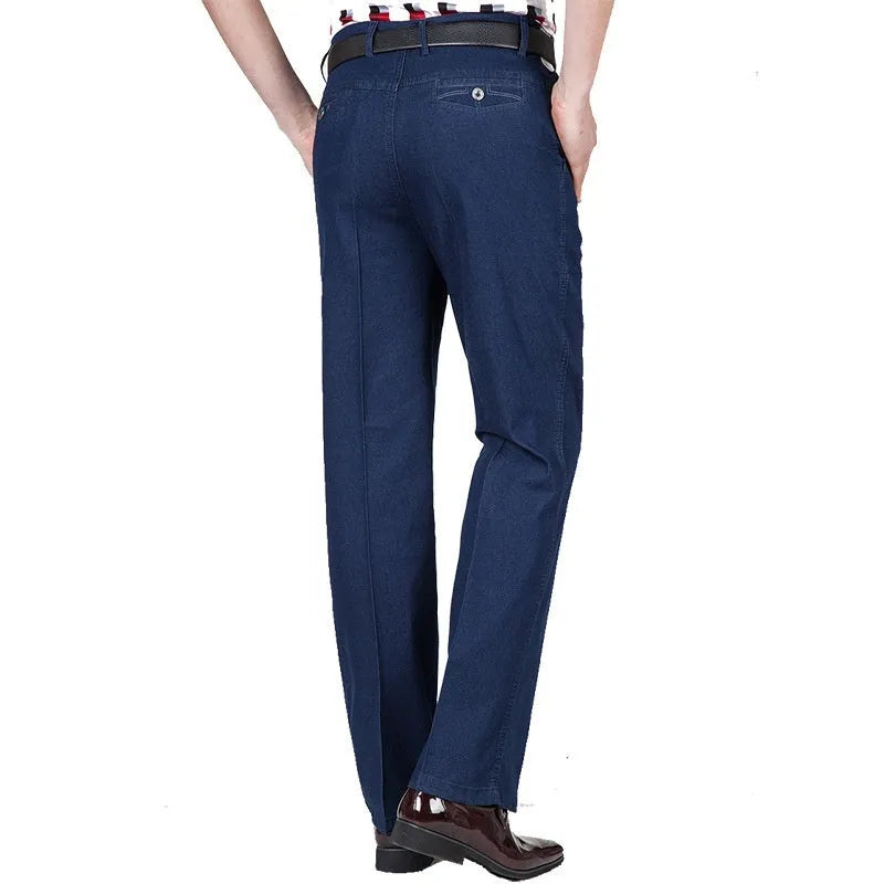 Men's high-waist loose fit blue denim trousers on a hanger, showing the casual cut and zipper fly.