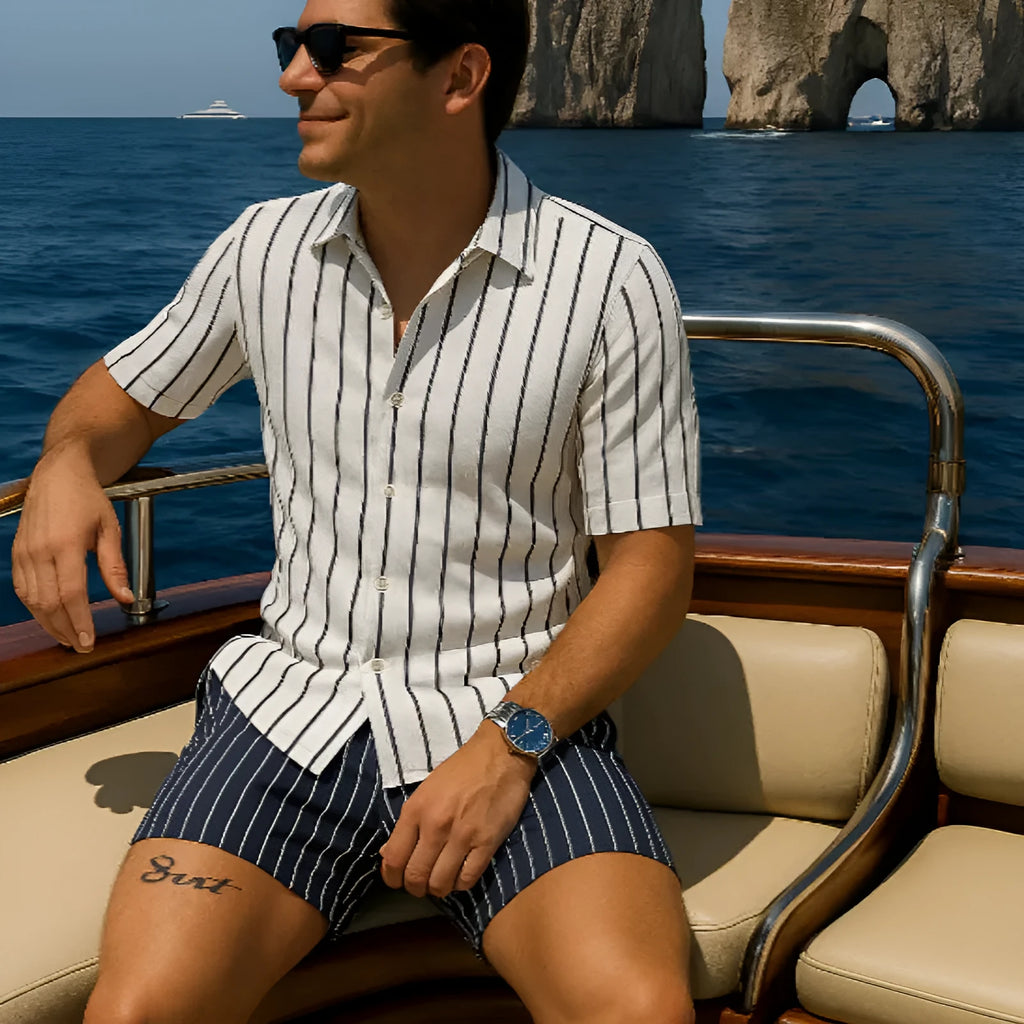 Man wearing a light-coloured elastic beach shirt and matching shorts set for summer.