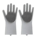 Blue silicone gloves with textured palm for scrubbing, shown on hands holding a pan.