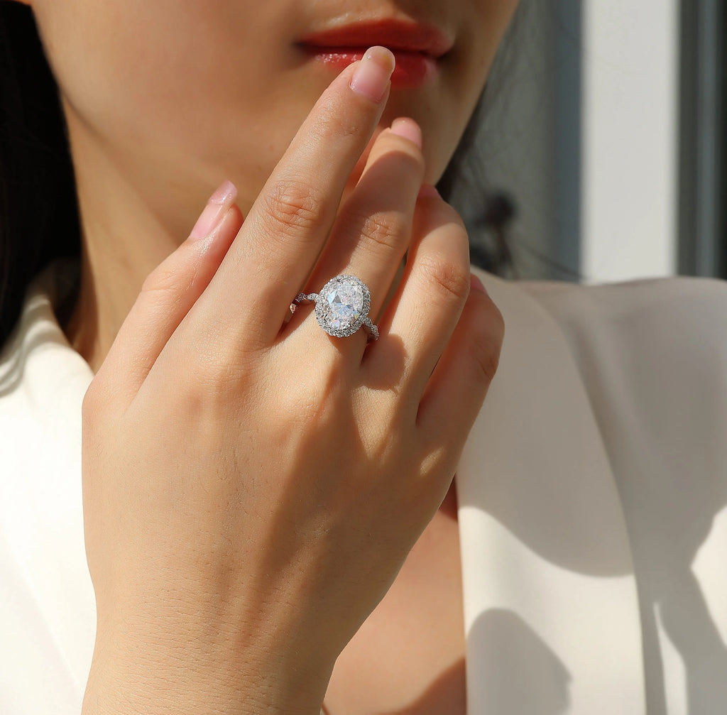 Egg-shaped moissanite wedding ring set in S925 silver with platinum plating, 8x12mm stone, sizes 5-9
