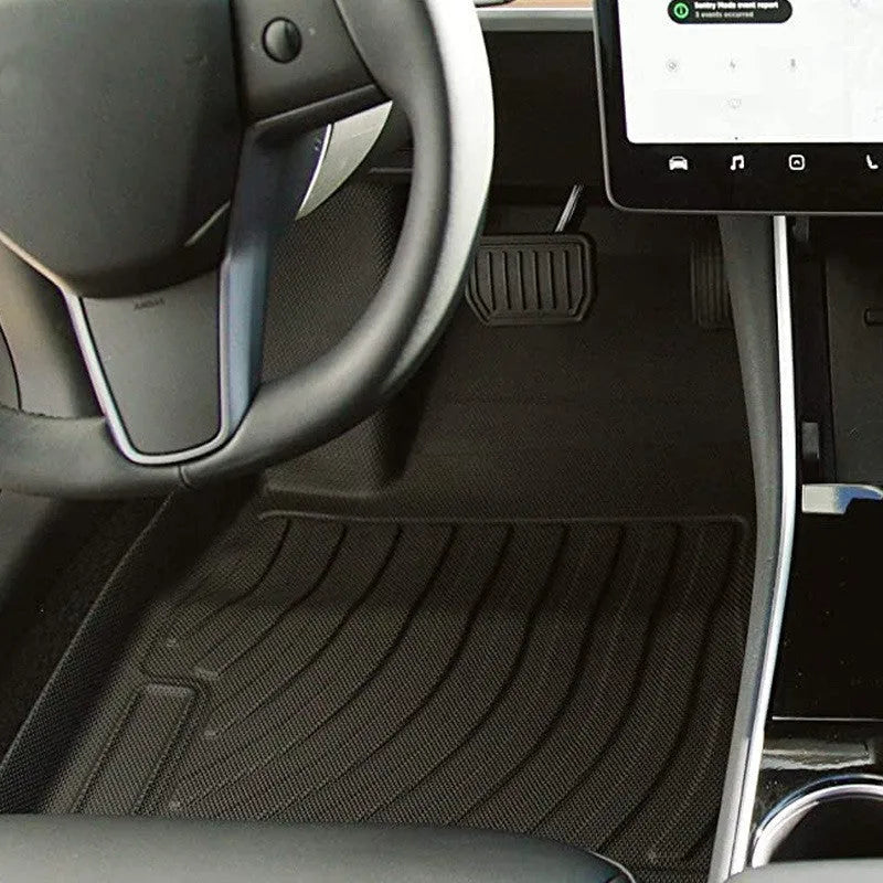 Rubber floor mats with TPE footrest designed for Tesla Model 3, Y, X, and S cars.