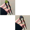 U-shaped acrylic hair barrettes with ball retro design in beige, caramel, dark gray and green colours