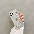 Transparent iPhone case with a love heart and bracelet chain design on a soft TPU background.