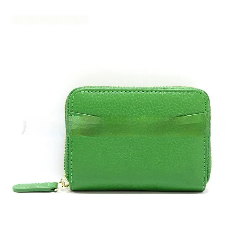 Genuine leather zipper coin purse in solid colour with anti-theft feature and sewing line detail.