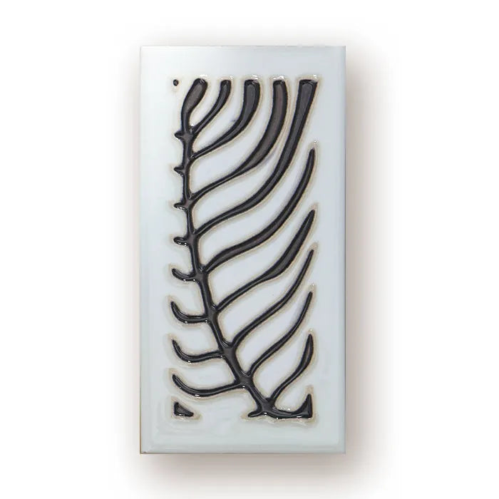 Handmade retro-style ceramic doorplate with an enamel art number on a white background.