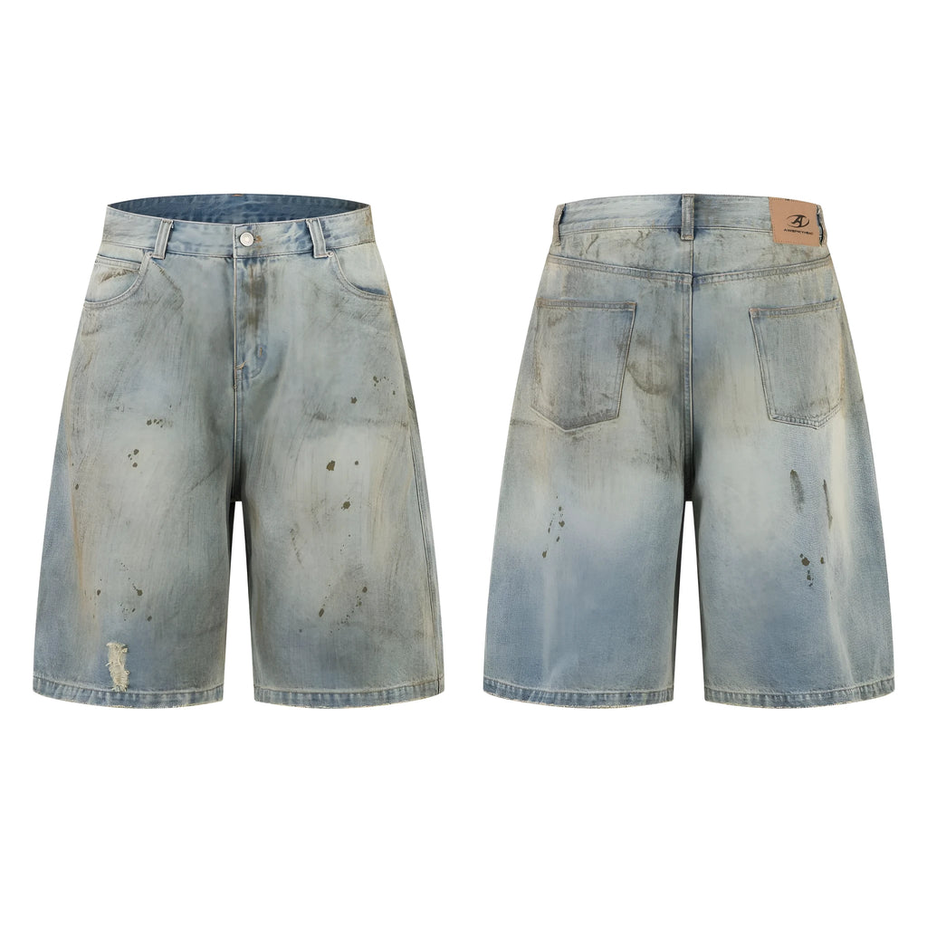 Blue cropped denim trousers with a straight leg and zip fly on a hanger
