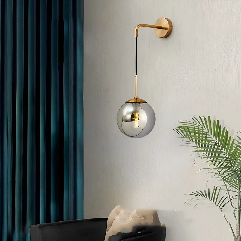 Nordic glass wall lamp with amber glass shade, black metal body, mounted on wall