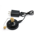 Black rechargeable hearing aid amplifier with silicone ear tips for elderly users