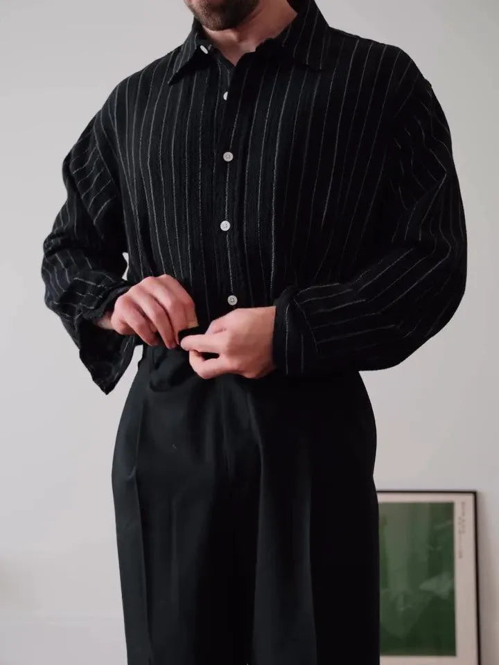 Black pinstriped men's button-down shirt with long sleeves and a regular fit.