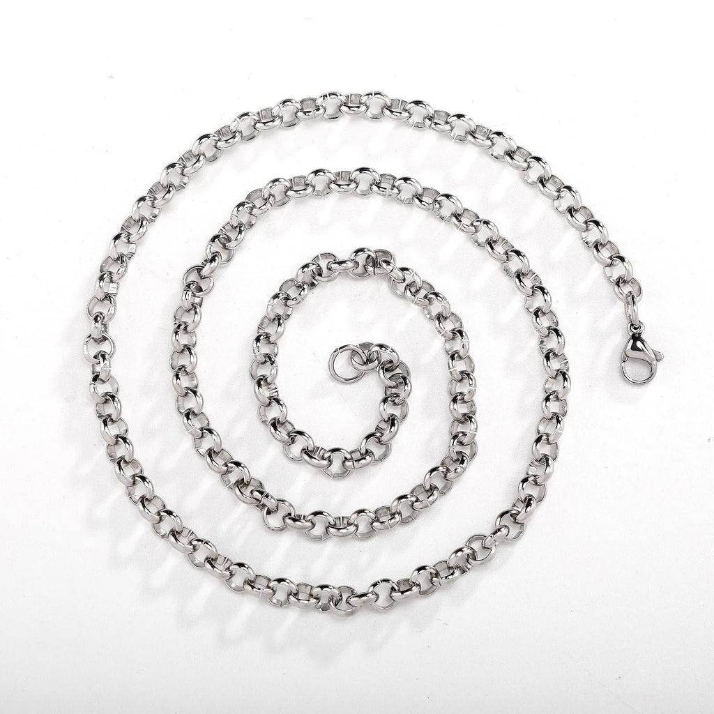 Silver stainless steel men's punk ring buckle necklace with O-ring chain and copper zircon pendant on display