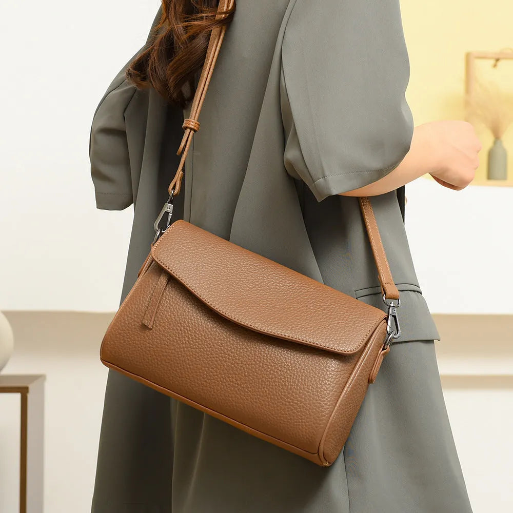 Casual women's genuine leather shoulder messenger bag in black with double strap and lining