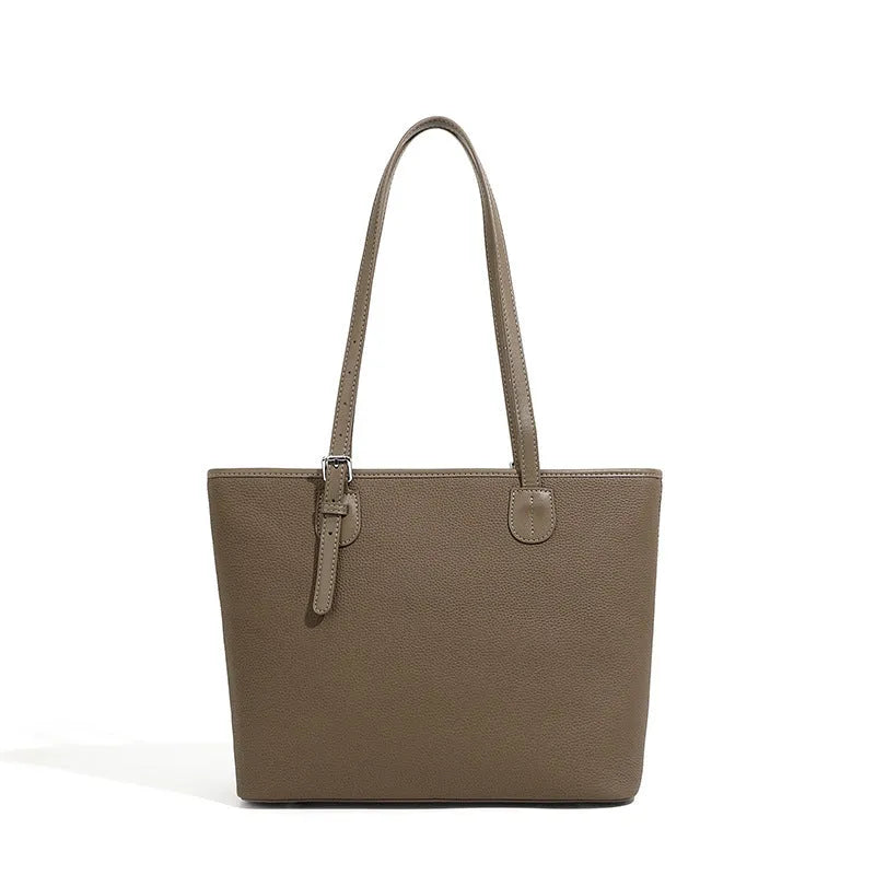 Genuine leather women's tote bag in retro style showing multiple compartments and horizontal suitcase shape