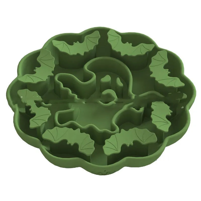 Silicone dog slow feeder bowl in a hexagonal shape on a floor, showing textured surface for slowing eating pace.