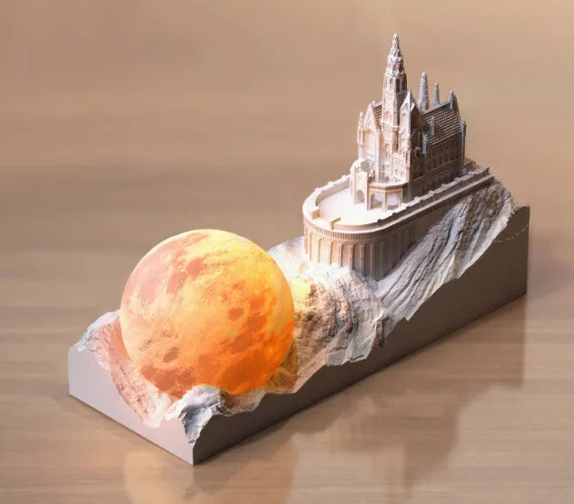 Mountain-shaped aromatherapy night light with touch control, LED lamp, essential oil and card gift set on a desk