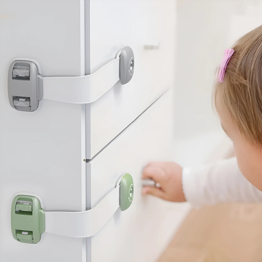 Adjustable grey child safety lock with strap for cabinets and drawers using 3M adhesive tape