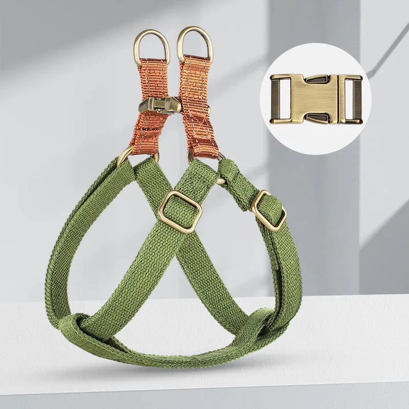 Brown vest-style dog leash harness on small dog showing chest design and alloy fastener