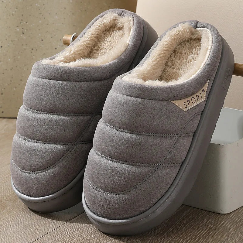 Plush indoor slippers with suede upper, EVA sole, and short plush lining in grey, khaki, coffee, or camel.