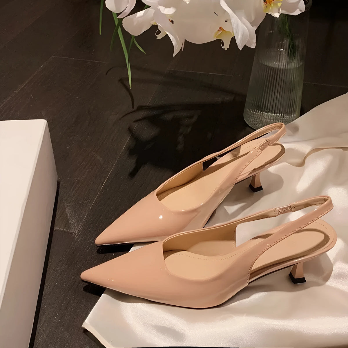 Women's pointed-toe mid heel stiletto pumps in nude or black microfiber, sizes 34-42, shallow mouth design