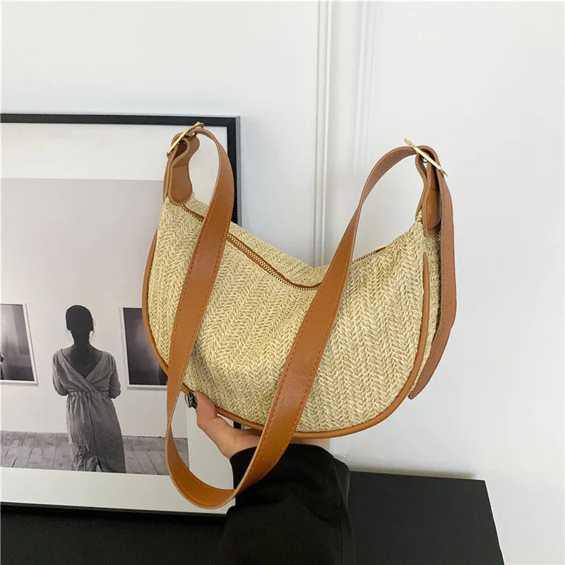 Women's woven straw crossbody bag with internal phone compartment and file storage