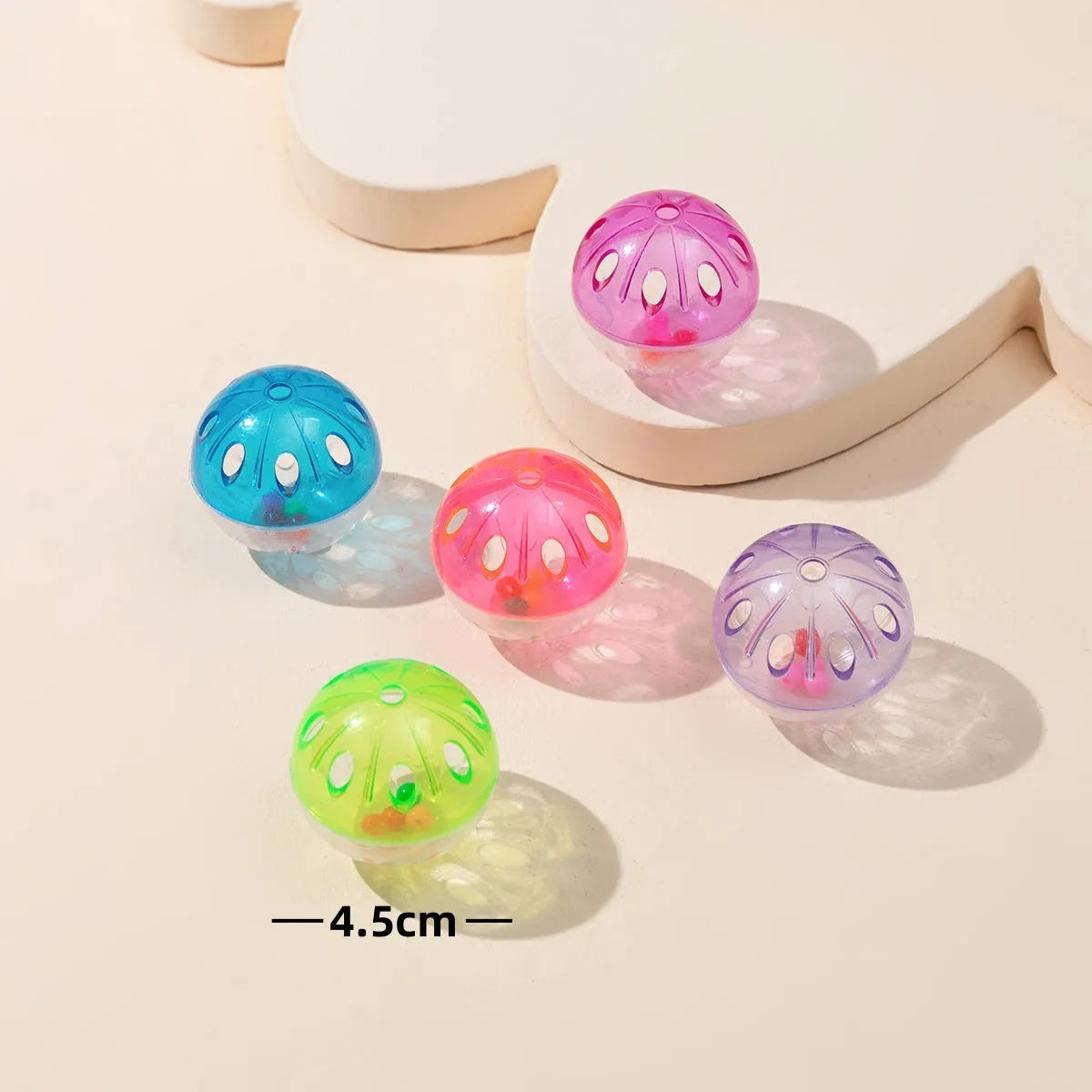 Colored plastic bell mesh hollow sound cat teasing ball in rainbow colour