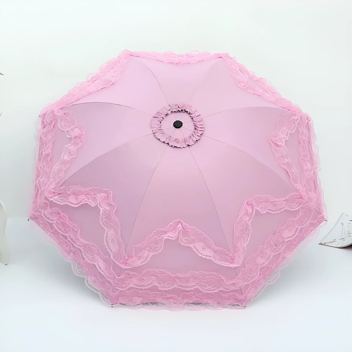 Tri-fold sun umbrella with four-layer lace edge, NC fabric canopy, vinyl lamination, and eight steel ribs in six colours