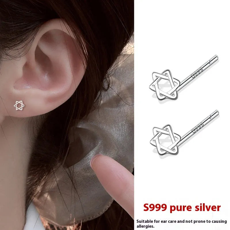 999 pure silver anti-blocking ear studs in butterfly shape on white background