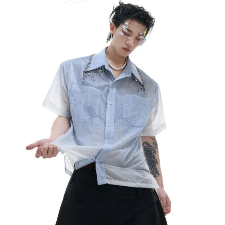 Blue loose fit short sleeve casual shirt on a hanger.