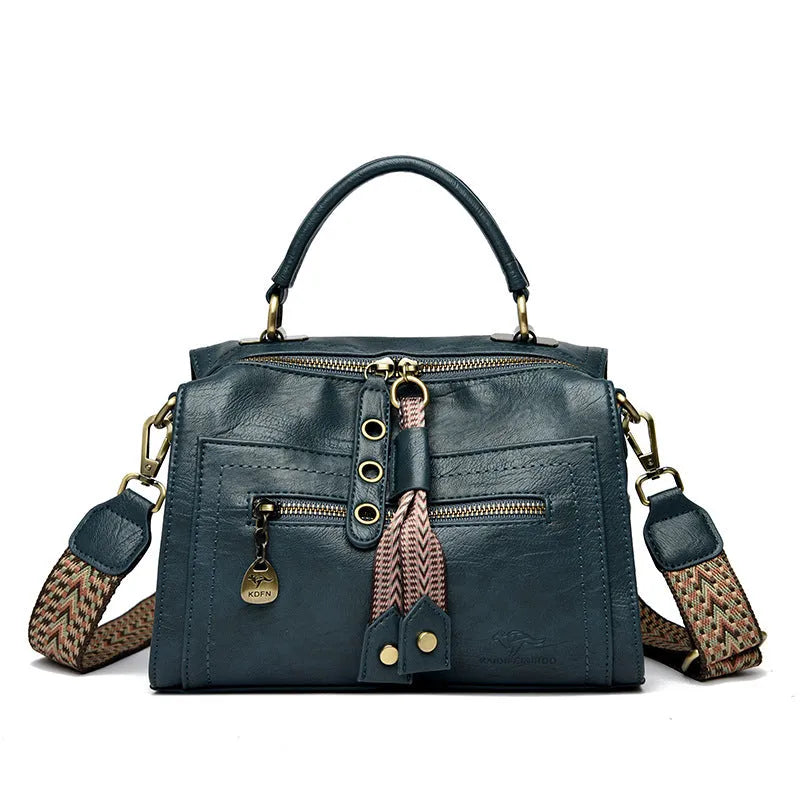 Women's retro style crossbody bag in six colour options with sandwich pocket design