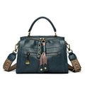 Women's retro style crossbody bag in six colour options with sandwich pocket design