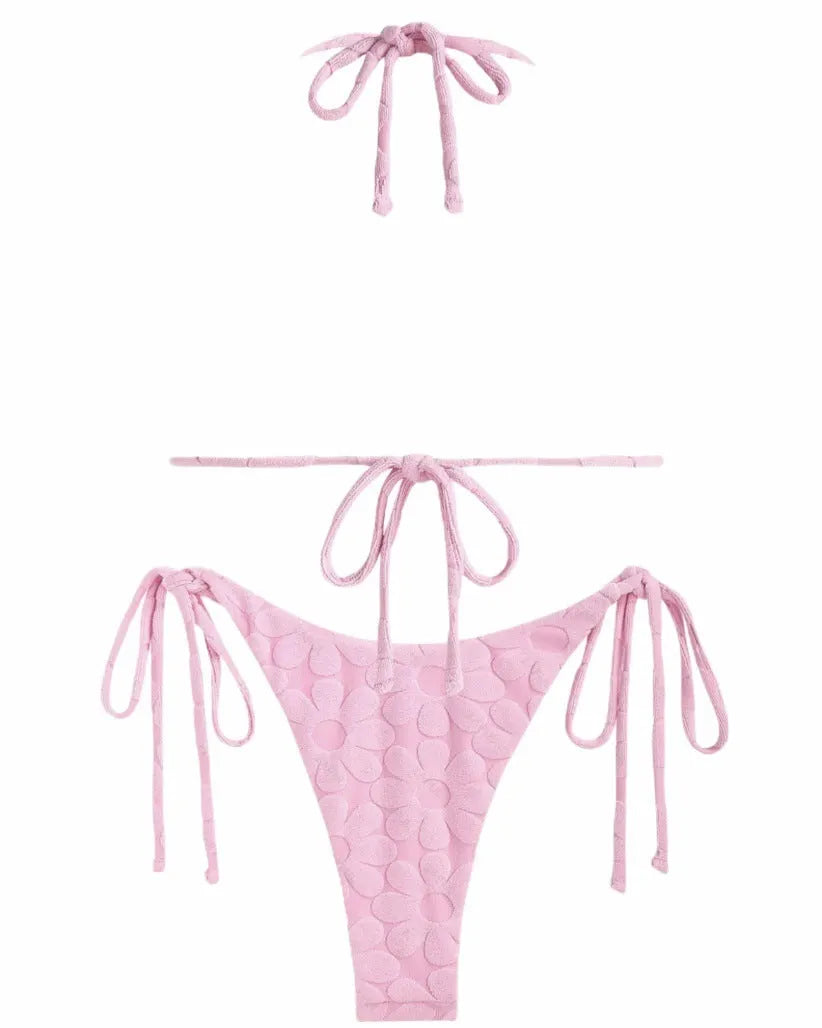 Light blue women's backless bikini set with wind strap design on a mannequin.