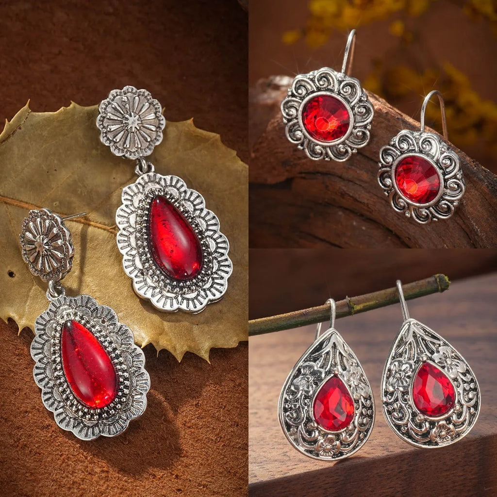 Retro bohemian carved ruby drop earrings for women in red alloy finish