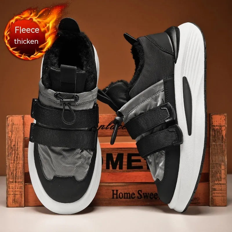 Men's black and gray striped lace-up platform sneakers with cotton upper and PVC sole on display