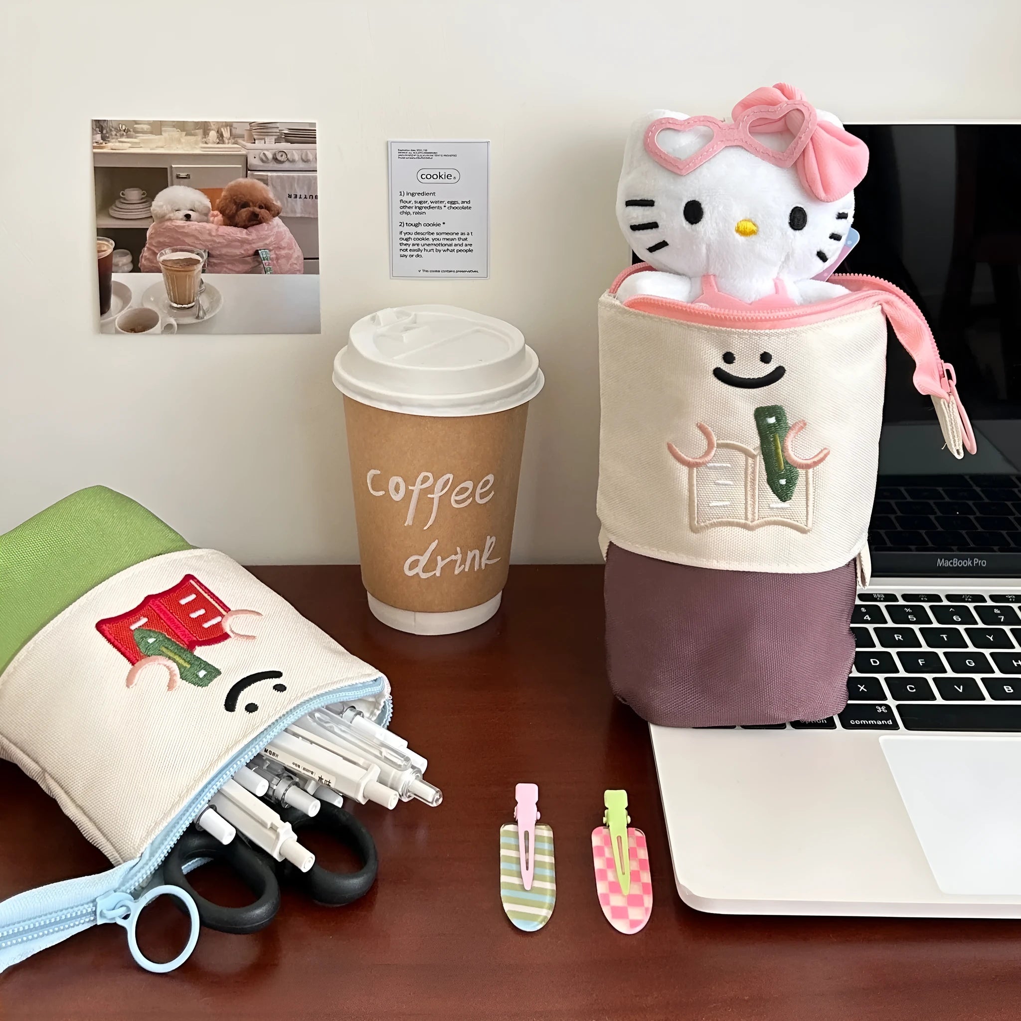 Brown collapsible pencil case with cartoon design, shown open and closed