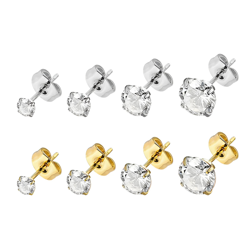 Simple geometric stud earrings with zircon stone in gold or steel colour on grey background.