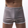 Men's solid-colour three-point boxer shorts laid flat, showing mid-waist band and three-point fly design.