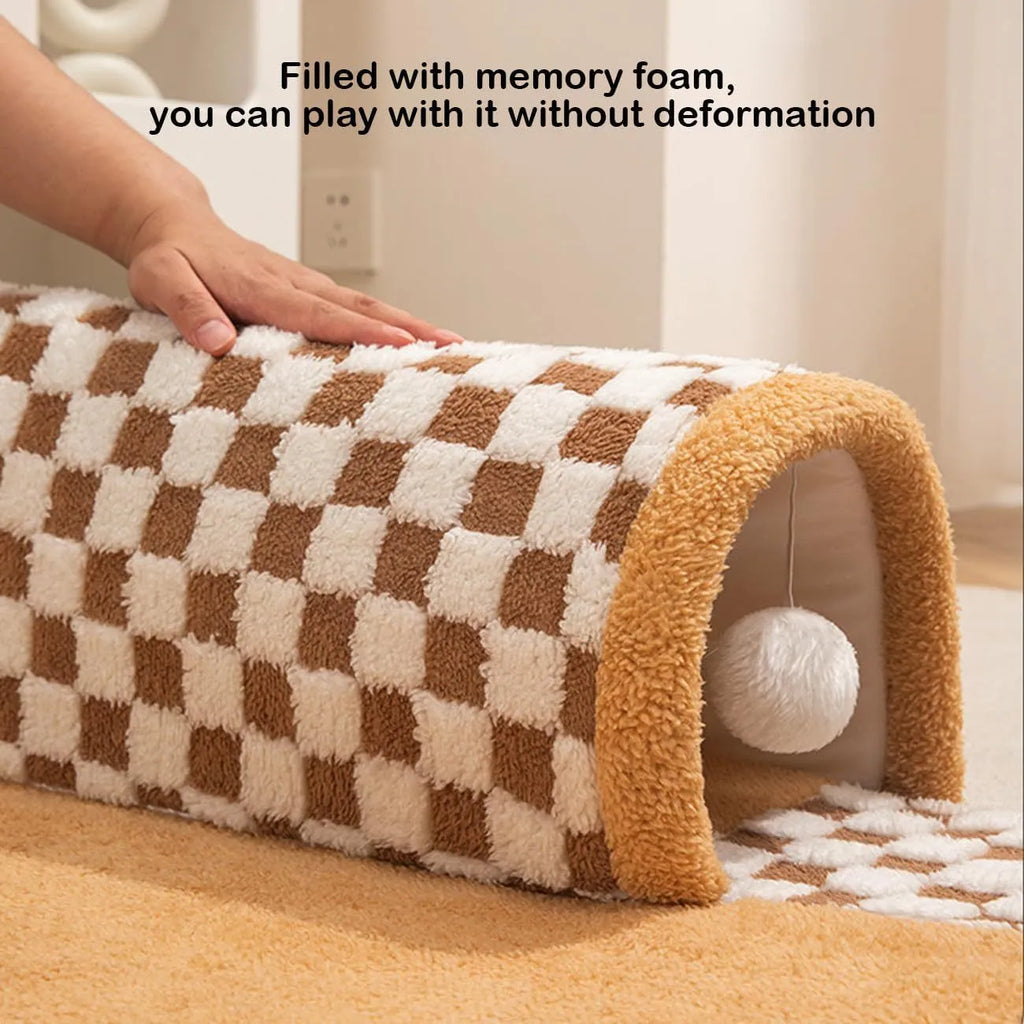 Coffee coloured plush fan-shaped pet bed with integrated tunnel for cats and dogs, showing thick mat and anti-slip base.