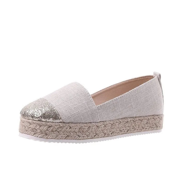 Plus size breathable canvas flat shoes in black with round toe and slip-on design