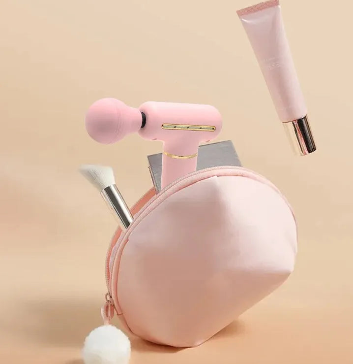 Mini massage gun in green or pink with brushless motor, USB power, 20 x 16.5 x 5.6 cm size, and 327 g weight