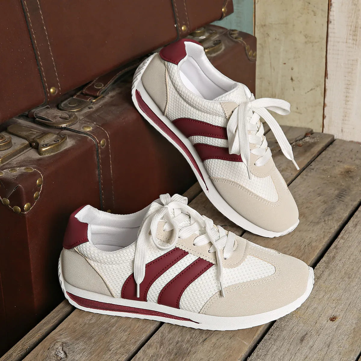 Wine red Cortez retro sneakers with cross-strap detail and mesh lining