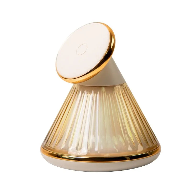 Night table lamp with integrated wireless charging station showing magnetic seat for smartphones