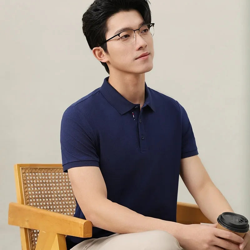 Solid colour cotton blend catering polo shirt shown in multiple colours with short sleeves and regular fit