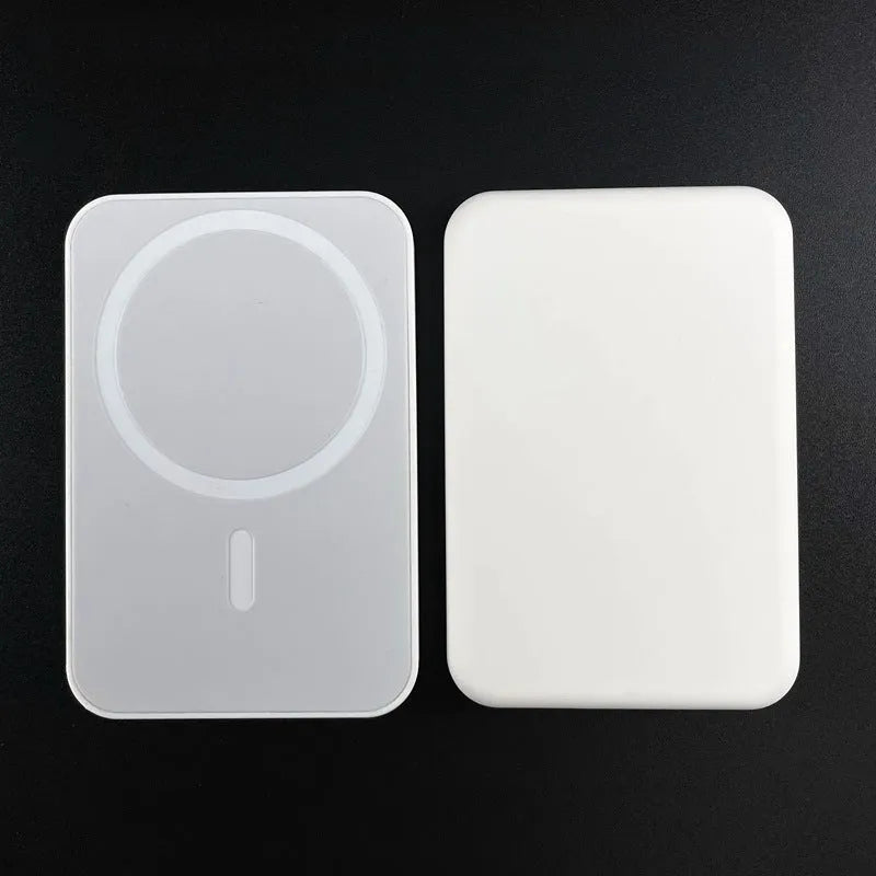 Compact magnetic wireless power bank with 5000mAh capacity in white PVC housing