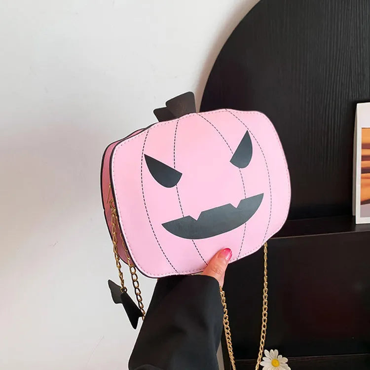 Halloween cartoon pumpkin shoulder bag for girls in colour options with chain crossbody strap on white background