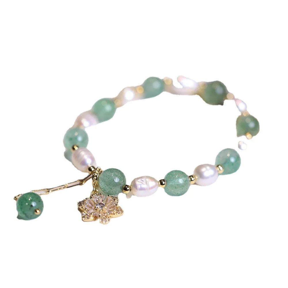 Green freshwater pearl bracelet with geometric strawberry beads and Chinese knot closure